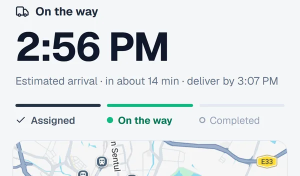 The real tracking page: On the way, estimated arrival 2:56 PM (sample delivery)
